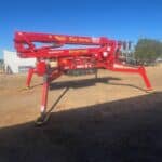 Red bucket truck we use for tree removal and tree trimming