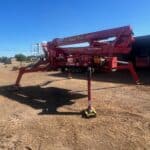 Large red tree trimming equipment